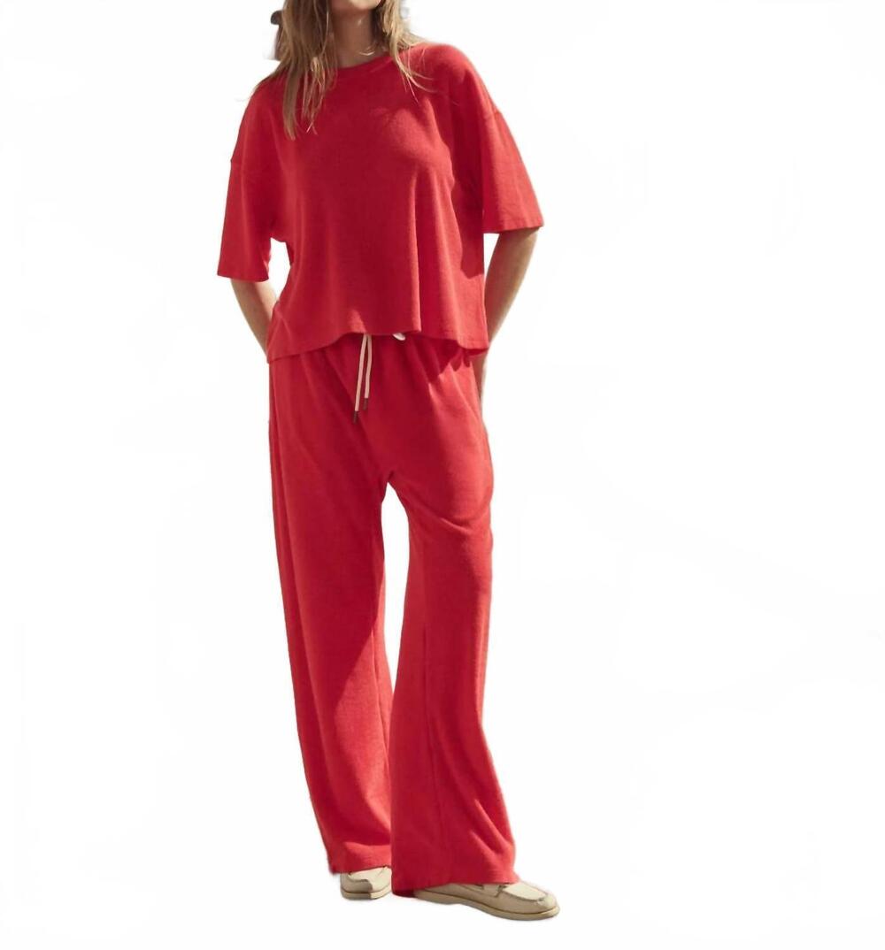 NEW THE GREAT. micro terry horseshoe sweat pant in pimento